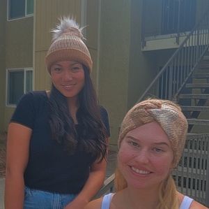 Beanie with a pom pom and a matching ear warmer/headband